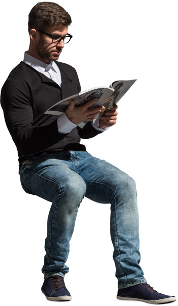 Sitting man with a magazine image