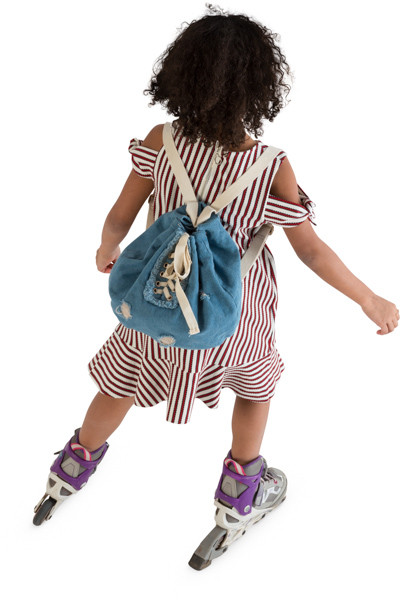 Girl riding on roller skates image