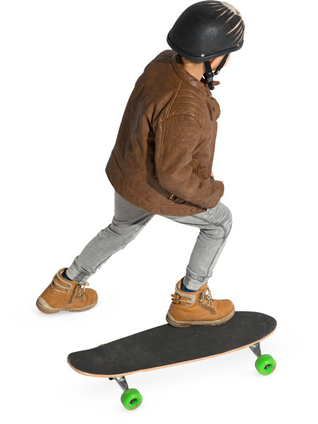 Boy riding on skateboard image