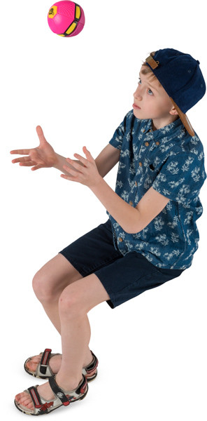 Boy throwing small ball image