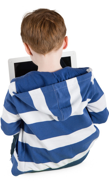 Sitting boy with laptop image