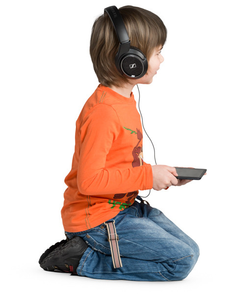 Sitting boy with tablet image