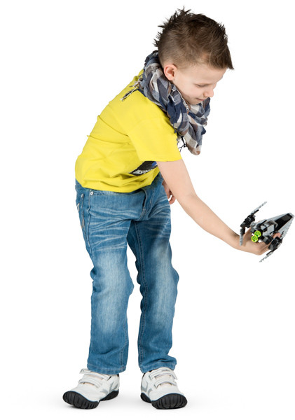 Boy playing with bricks spaceship image