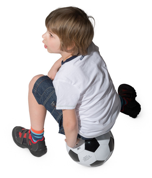 Boy sitting on ball image