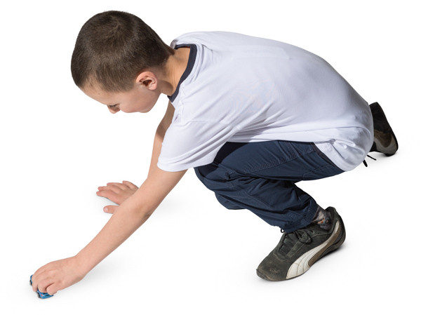 Boy playing with toy car image