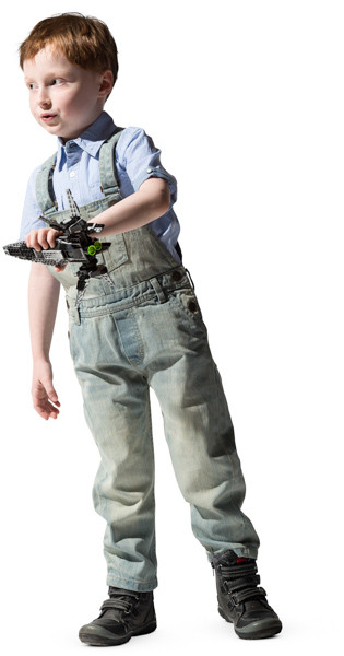Boy playing with bricks spaceship image
