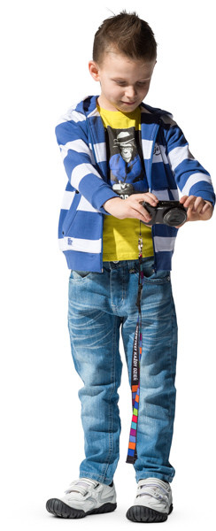 Standing boy taking picture image