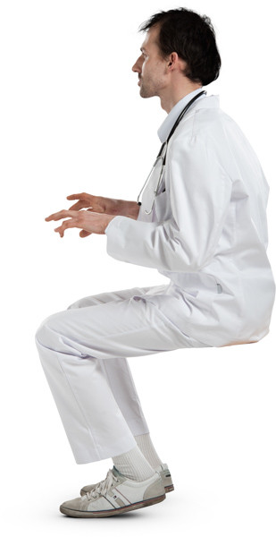 Sitting doctor typing on keyboard image