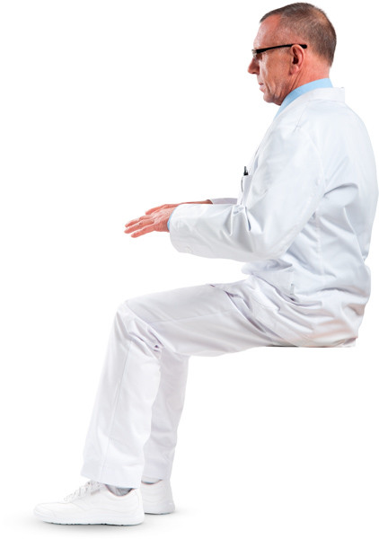 Sitting doctor typing on keyboard image