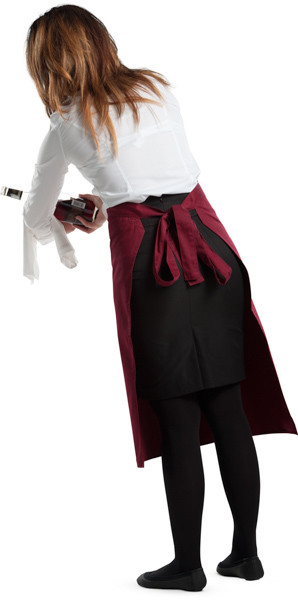 Waitress serving bottle of wine image