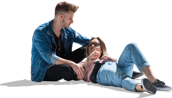 Couple relaxing on the ground image