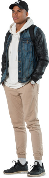 Man standing with hands in pockets image