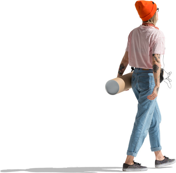 Girl with headphones and cap walk in image