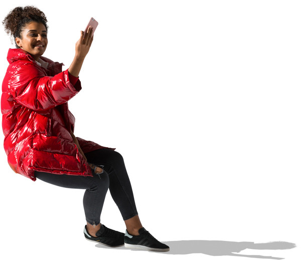 Black woman sitting and take a selfie image