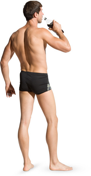 Man with shorts drinking image