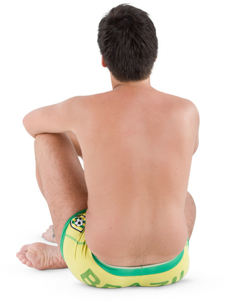 Man sitting in yellow summer swimwear image