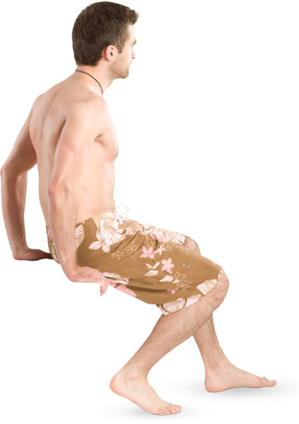 Sitting man in long shorts image