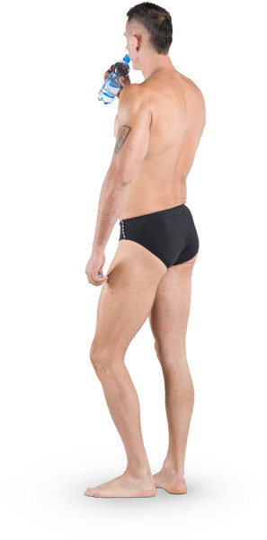 Man in black swimwear drinking water image