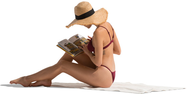 Young woman reading a newspaper image