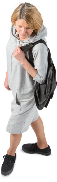 Walking woman with backpack image