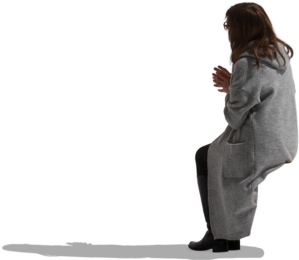 Sitting woman in long sweater image