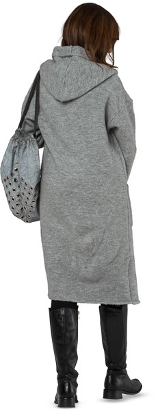 Mature brunette standing with bag image