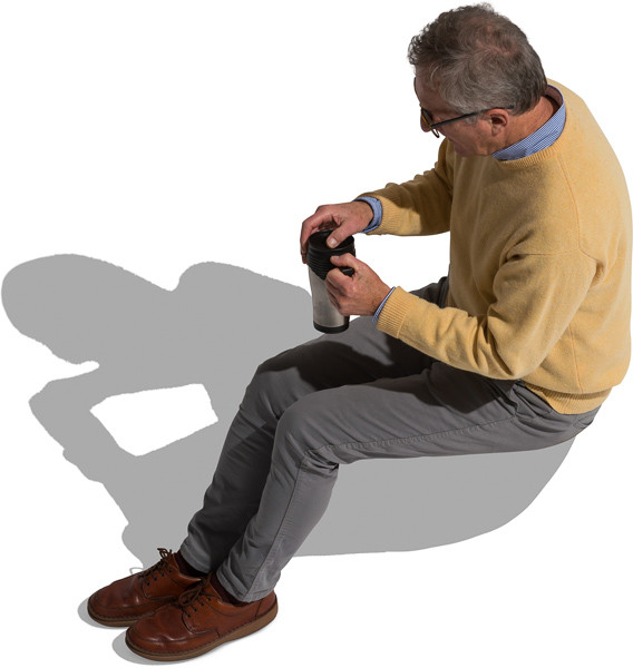 Older man sitting with black cup image