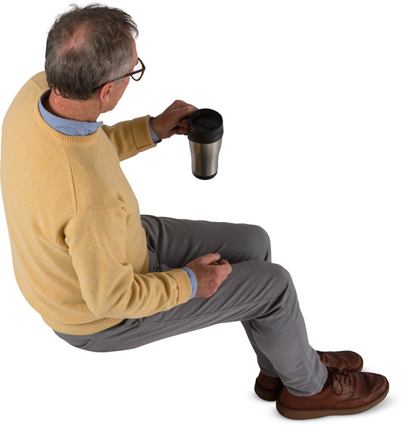 Man sitting and drinking image