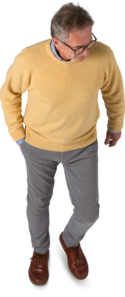 Walking man in yellow sweater image