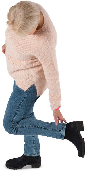 Woman checking the shoe image