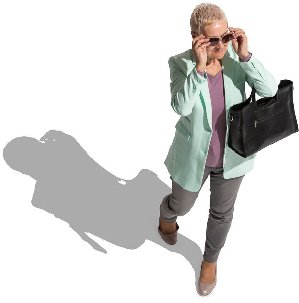 Woman in sunglasses walking image