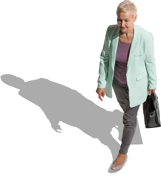 Mature woman walking with bag image