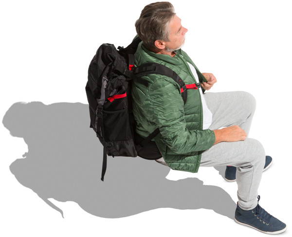 Sitting man in green jacket image