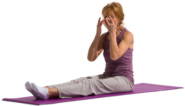Woman resting on mat image
